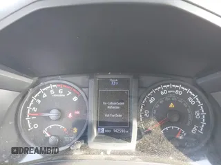 2022 Toyota Tacoma SR with VIN 3TYRX5GNXNT038474, listed as a IAAI auction lot 42090753 with 142,590 mi miles and . Bid and sale history available at DreamBid. Image 7.