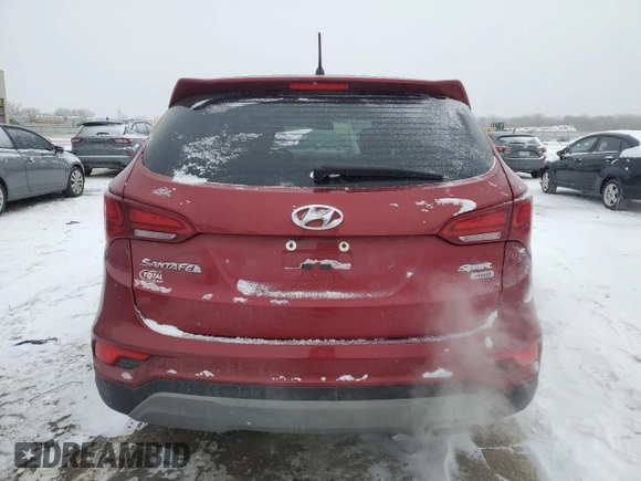 2018 Hyundai Santa Fe 2.4L z VIN 5XYZTDLB0JG547428, wystawiony jako Copart lot #45593005 z przebiegiem 51 394 mil mil oraz Szkoda całkowita • Salvage title. Historia ofert i sprzedaży dostępna na DreamBid. Obrazek 6.