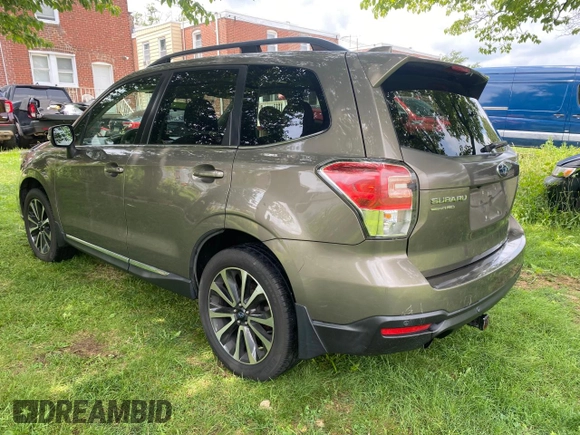 2017 Subaru Forester Touring с VIN JF2SJGWC9HH402713, выставлен на аукционе Copart как лот 63635365 с пробегом 128 906 миль миль и Чистый • Clean title. История ставок и продаж доступна на DreamBid. Изображение 3.
