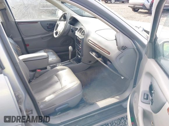 1999 Oldsmobile Cutlass GLS z VIN 1G3NG52M4X6319701, wystawiony jako IAAI lot #41616474 z przebiegiem 177 667 mil mil oraz . Historia ofert i sprzedaży dostępna na DreamBid. Obrazek 5.