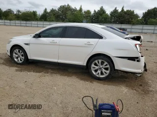 2012 Ford Taurus SEL z VIN 1FAHP2EW8CG138653, wystawiony jako Copart lot #56750215 z przebiegiem 159 631 mil mil oraz Szkoda całkowita • Salvage title. Historia ofert i sprzedaży dostępna na DreamBid. Obrazek 2.