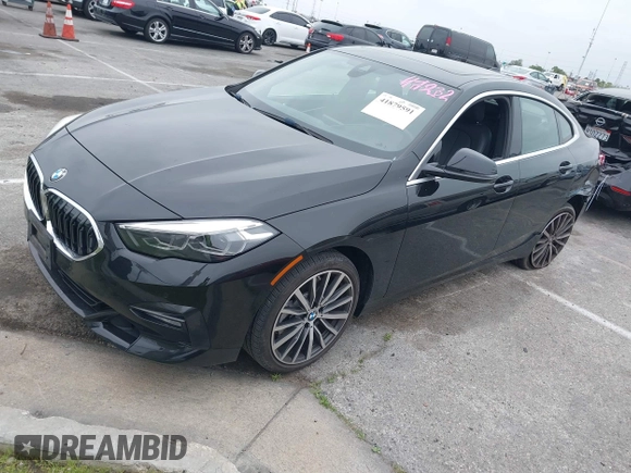 2021 BMW 2 Series 228i with VIN WBA53AK04M7H59327, listed as a IAAI auction lot 41879591 with 13,855 mi miles. Bid and sale history available at carsss.com. Image 17.