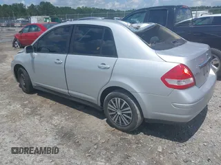 2011 Nissan Versa S with VIN 3N1BC1AP4BL446596, listed as a IAAI auction lot 42425302 with 141,047 mi miles and . Bid and sale history available at DreamBid. Image 3.