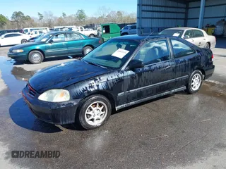 1999 Honda Civic HX with VIN 1HGEJ7123XL068508, listed as a IAAI auction lot 41803733 with 191,412 mi miles. Bid and sale history available at carsss.com. Image 2.