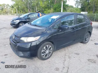 2016 Honda Fit LX with VIN JHMGK5H59GS002090, listed as a IAAI auction lot 41761887 with 97,577 mi miles. Bid and sale history available at carsss.com. Image 2.