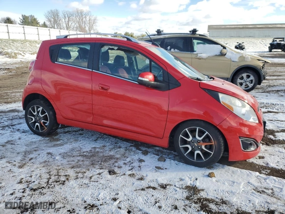 2015 Chevrolet Spark LT with VIN KL8CF6S99FC762768, listed as a Copart auction lot 82169414 with 0 mi miles and Salvage Title. Bid and sale history available at carsss.com. Image 4.