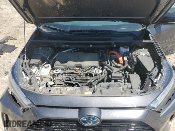 2023 Toyota RAV4 Hybrid XSE with VIN 2T3E6RFV9PW039963, listed as a Copart auction lot 57594335 with 27,486 mi miles and Salvage title. Bid and sale history available at DreamBid. Image 12.