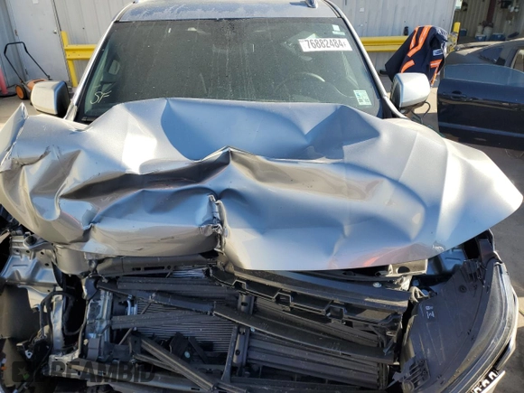 2024 Chevrolet Suburban LS with VIN 1GNSCBKD3RR252188, listed as a Copart auction lot 76882484 with 11,997 mi miles and Salvage Title. Bid and sale history available at DreamBid. Image 12.