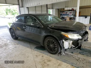 2016 Toyota Avalon Limited with VIN 4T1BK1EB9GU216124, listed as a Copart auction lot 54565495 with 192,136 mi miles and Salvage Title. Bid and sale history available at DreamBid. Image 4.