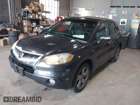 2007 Acura RDX with VIN 5J8TB18207A007085, listed as a IAAI auction lot 42556748 with 303,475 mi miles and . Bid and sale history available at DreamBid. Image 2.