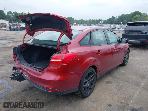 2016 Ford Focus SE with VIN 1FADP3F24GL249455, listed as a IAAI auction lot 40421121 with 49,043 mi miles. Bid and sale history available at carsss.com. Image 4.