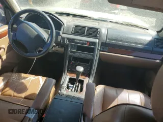 1996 Land Rover Range Rover z VIN SALPE1449TA343061, wystawiony jako Copart lot #53206805 z przebiegiem 239 085 mil mil oraz Tytuł czysty. Historia ofert i sprzedaży dostępna na DreamBid. Obrazek 8.