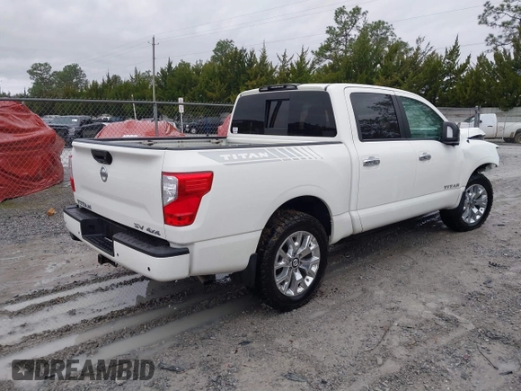 2021 Nissan Titan Pro-4X with VIN 1N6AA1ED6MN535519, listed as a IAAI auction lot 41482187 with 62,698 mi miles and . Bid and sale history available at DreamBid. Image 4.