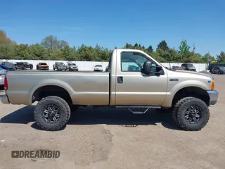 2001 Ford F-250 XL z VIN 1FTNF21L91EC17897, wystawiony jako IAAI lot #42216133 z przebiegiem 220 682 mil mil oraz . Historia ofert i sprzedaży dostępna na DreamBid. Obrazek 13.