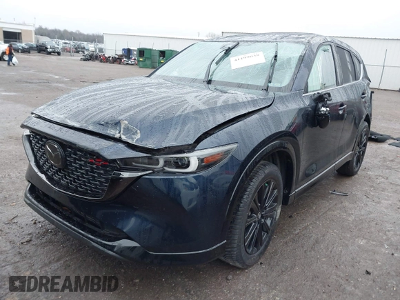 2022 Mazda CX-5 2.5 Turbo with VIN JM3KFBAY8N0635618, listed as a IAAI auction lot 41199038 with Not Provided miles and . Bid and sale history available at carsss.com. Image 17.