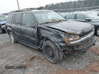 2003 Chevrolet TrailBlazer EXT LT with VIN 1GNES16S936153421, listed as a IAAI auction lot 41580895 with 264,511 mi miles and . Bid and sale history available at DreamBid. Image 1.