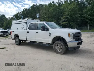 2018 Ford F-250 XL with VIN 1FT7W2B64JEC03990, listed as a Copart auction lot 61021315 with 208,711 mi miles and Clean title. Bid and sale history available at DreamBid. Image 4.