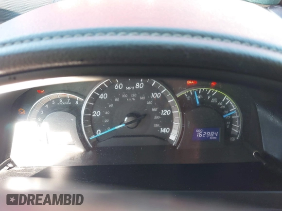 2014 Toyota Camry L with VIN 4T1BF1FK1EU817205, listed as a IAAI auction lot 41753999 with 162,984 mi miles. Bid and sale history available at carsss.com. Image 7.