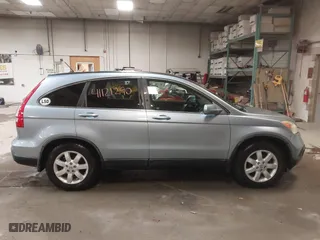 2009 Honda CR-V EX-L with VIN 5J6RE48739L037292, listed as a IAAI auction lot 41121290 with 150,597 mi miles. Bid and sale history available at carsss.com. Image 13.