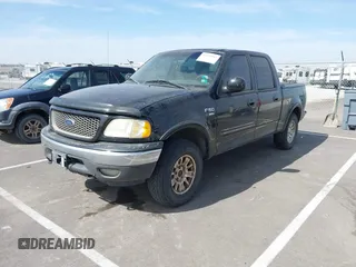 2003 Ford F-150 XLT with VIN 1FTRW08L83KA14760, listed as a IAAI auction lot 41820943 with 215,130 mi miles. Bid and sale history available at carsss.com. Image 19.