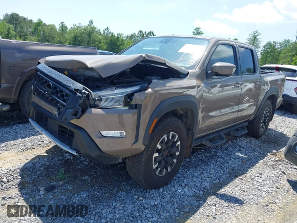2023 Nissan Frontier Pro-4X z VIN 1N6ED1EK1PN602636, wystawiony jako IAAI lot #42018405 z przebiegiem 58 012 mil mil oraz . Historia ofert i sprzedaży dostępna na DreamBid. Obrazek 17.