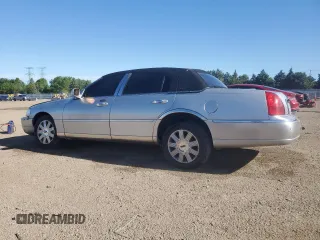 2004 Lincoln Town Car Ultimate z VIN 1LNHM83W94Y625182, wystawiony jako Copart lot #55632185 z przebiegiem 179 597 mil mil oraz Szkoda całkowita • Salvage title. Historia ofert i sprzedaży dostępna na DreamBid. Obrazek 2.
