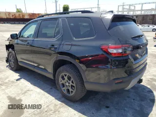 2025 Honda Pilot TrailSport with VIN 5FNYG1H62SB101798, listed as a Copart auction lot 55340585 with 1,065 mi miles and Salvage title. Bid and sale history available at DreamBid. Image 2.