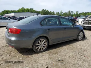 2014 Volkswagen Jetta SE with VIN 3VWD17AJ0EM246952, listed as a Copart auction lot 57507645 with 127,764 mi miles and Clean title. Bid and sale history available at DreamBid. Image 3.