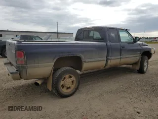 1999 Dodge Ram 2500 with VIN 1B7KF2368XJ511110, listed as a Copart auction lot 68945174 with 173,983 mi miles and Salvage Title. Bid and sale history available at carsss.com. Image 3.