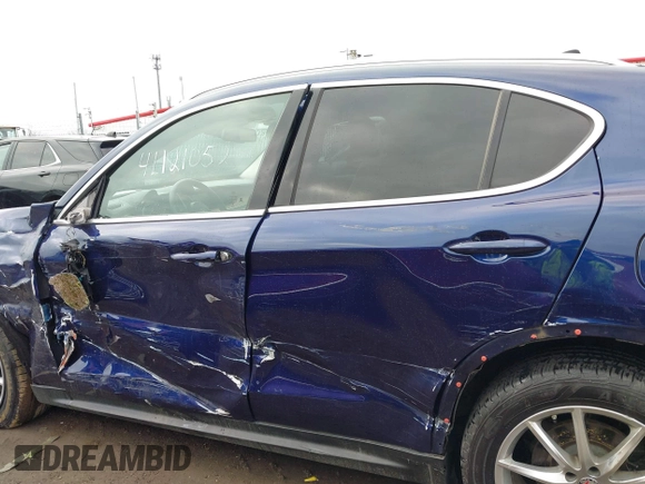 2019 Alfa Romeo Stelvio Ti z VIN ZASPAKBN4K7C43201, wystawiony jako IAAI lot #41121052 z przebiegiem 32 768 mil mil oraz . Historia ofert i sprzedaży dostępna na DreamBid. Obrazek 14.