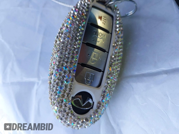 2015 Infiniti Q50 Premium with VIN JN1BV7APXFM333101, listed as a IAAI auction lot 41667109 with 112,477 mi miles and . Bid and sale history available at DreamBid. Image 11.