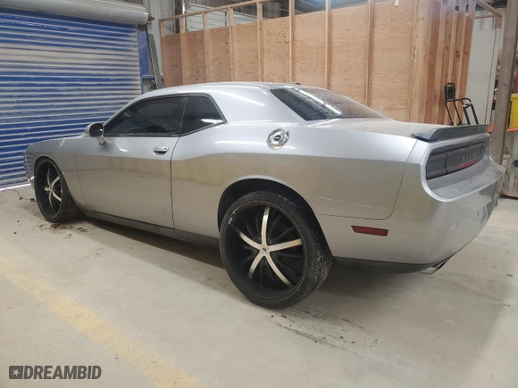 2013 Dodge Challenger Rallye Redline with VIN 2C3CDYAG6DH616173, listed as a Copart auction lot 46070745 with 137,024 mi miles and Salvage Title. Bid and sale history available at carsss.com. Image 2.