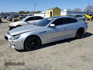 2013 BMW 6 Series 650i z VIN WBA6B2C58DD128389, wystawiony jako Copart lot #46877875 z przebiegiem Nie podano mil oraz Szkoda całkowita • Salvage title. Historia ofert i sprzedaży dostępna na DreamBid. Obrazek 1.