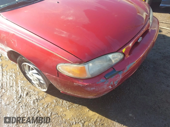 1999 Ford Escort SE z VIN 1FAFP13P6XW180845, wystawiony jako IAAI lot #41398242 z przebiegiem 59 300 mil mil oraz . Historia ofert i sprzedaży dostępna na DreamBid. Obrazek 6.