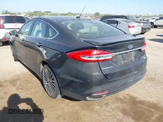 2017 Ford Fusion Titanium with VIN 3FA6P0K9XHR118057, listed as a IAAI auction lot 41982261 with 151,704 mi miles. Bid and sale history available at carsss.com. Image 3.