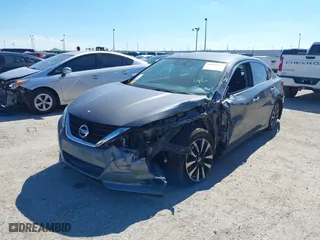 2018 Nissan Altima 2.5 SV with VIN 1N4AL3AP1JC102695, listed as a IAAI auction lot 40440992 with 58,063 mi miles. Bid and sale history available at carsss.com. Image 2.