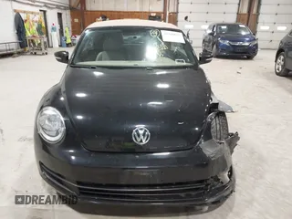 2014 Volkswagen Beetle 1.8T с VIN 3VW517AT5EM818796, выставлен на аукционе IAAI как лот 42318653 с пробегом 150 443 миль миль и . История ставок и продаж доступна на DreamBid. Изображение 12.