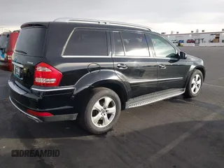 2011 Mercedes-Benz GL-Class GL 450 with VIN 4JGBF7BE1BA752615, listed as a IAAI auction lot 41075508 with 165,605 mi miles. Bid and sale history available at carsss.com. Image 4.
