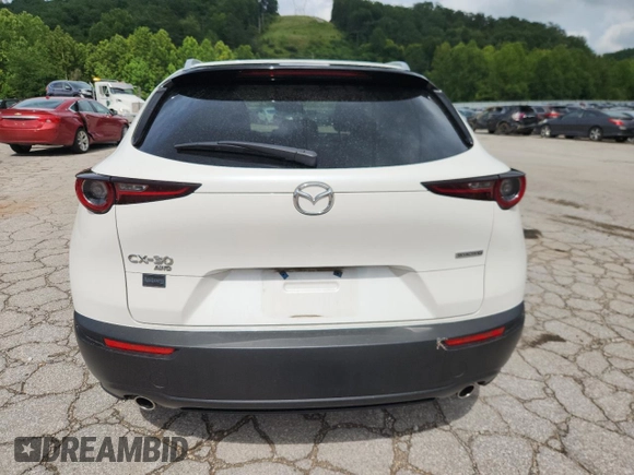 2023 Mazda CX-30 S Preferred with VIN 3MVDMBCM4PM511815, listed as a Copart auction lot 64192945 with Not provided miles and Salvage title. Bid and sale history available at DreamBid. Image 6.
