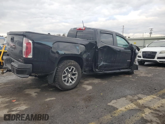 2022 GMC Canyon 4WD AT4 w/Cloth with VIN 1GTG6FEN7N1293630, listed as a Copart auction lot 89400665 with 19,261 mi miles and Salvage Title. Bid and sale history available at carsss.com. Image 3.