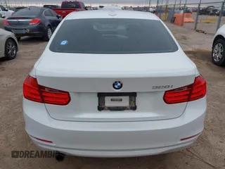 2015 BMW 3 Series 320i with VIN WBA3B1C5XFK140734, listed as a IAAI auction lot 42141319 with 84,863 mi miles and . Bid and sale history available at DreamBid. Image 16.