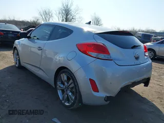 2012 Hyundai Veloster w/Black Int with VIN KMHTC6AD7CU063968, listed as a IAAI auction lot 41764263 with 83,634 mi miles and . Bid and sale history available at DreamBid. Image 3.