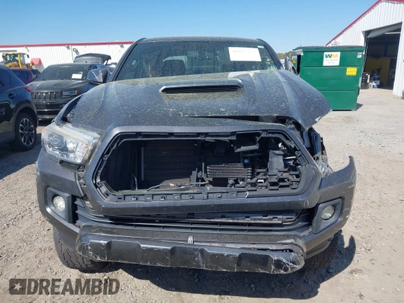 2017 Toyota Tacoma SR5 with VIN 5TFAZ5CN7HX033594, listed as a IAAI auction lot 41881117 with 86,676 mi miles and . Bid and sale history available at DreamBid. Image 12.