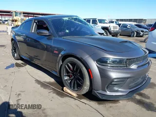 2022 Dodge Charger Scat Pack Widebody with VIN 2C3CDXGJ1NH204130, listed as a IAAI auction lot 41392893 with 9,515 mi miles and . Bid and sale history available at carsss.com. Image 1.