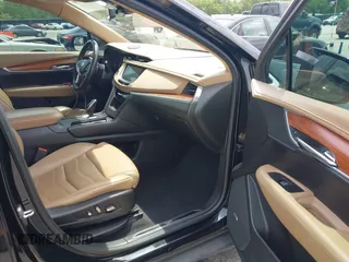 2017 Cadillac XT5 Platinum AWD z VIN 1GYKNFRS9HZ125677, wystawiony jako IAAI lot #42366784 z przebiegiem 152 116 mil mil oraz . Historia ofert i sprzedaży dostępna na DreamBid. Obrazek 5.