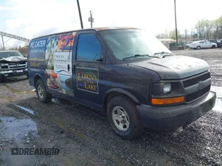 2006 Chevrolet Express Cargo Van with VIN 1GCFG15X561141733, listed as a IAAI auction lot 42006628 with 176,393 mi miles. Bid and sale history available at carsss.com. Image 1.