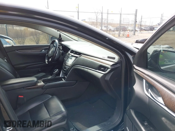 2018 Cadillac XTS Luxury with VIN 2G61M5S30J9145353, listed as a IAAI auction lot 41859404 with 137,874 mi miles. Bid and sale history available at carsss.com. Image 5.