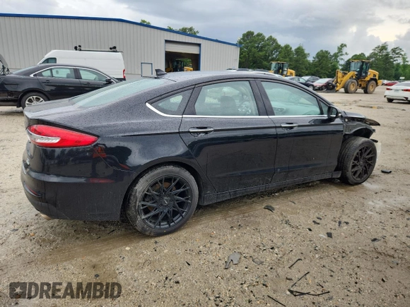 2020 Ford Fusion SEL with VIN 3FA6P0CD2LR115343, listed as a Copart auction lot 62756005 with 106,628 mi miles and Salvage title. Bid and sale history available at DreamBid. Image 3.
