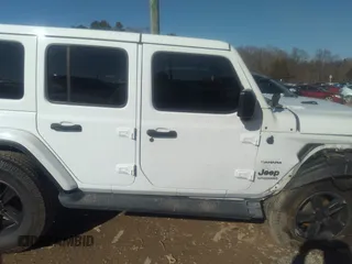 2018 Jeep Wrangler Unlimited Sahara z VIN 1C4HJXEG0JW207873, wystawiony jako IAAI lot #41213655 z przebiegiem 61 043 mil mil oraz . Historia ofert i sprzedaży dostępna na DreamBid. Obrazek 13.