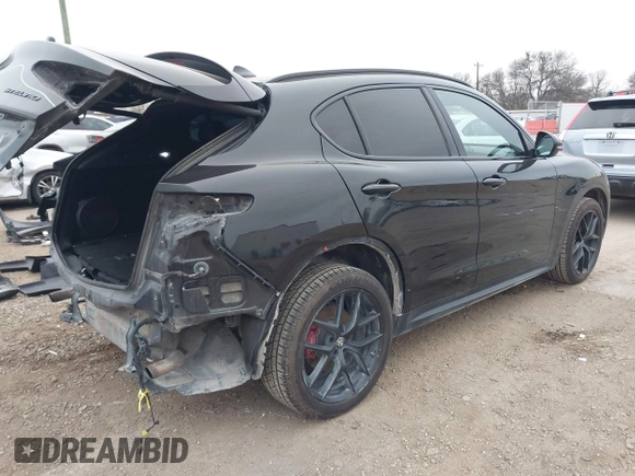 2019 Alfa Romeo Stelvio Ti z VIN ZASPAKBNXK7C44188, wystawiony jako IAAI lot #41320657 z przebiegiem 89 927 mil mil oraz . Historia ofert i sprzedaży dostępna na DreamBid. Obrazek 4.